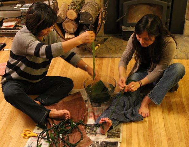 Jan (Kim's mom) and Kim making ti leaf lei for the CD release celebration